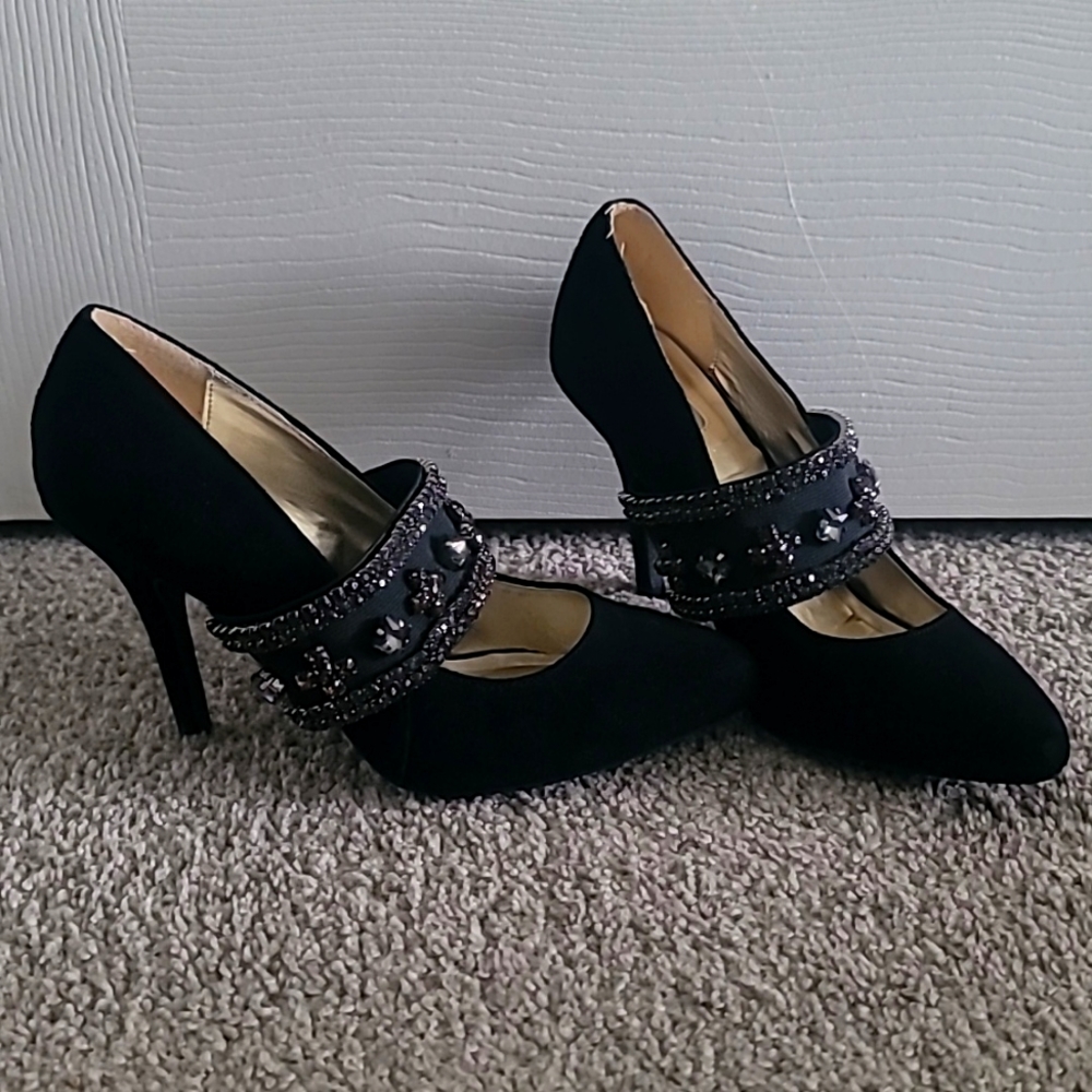 Mark. Heels black with gems